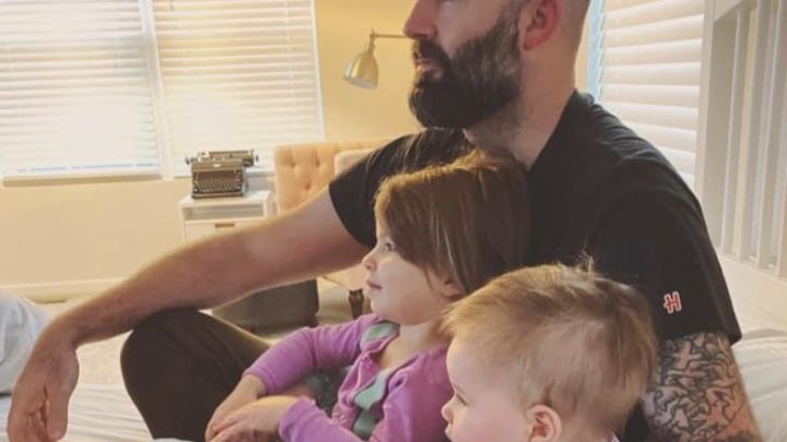This month's charity is to benefit Ryan Horn, a close personal friend Ryan Horn who was diagnosed with Cancer. Pictured is him, mid 30's, white male, beard, with his 2 small children.