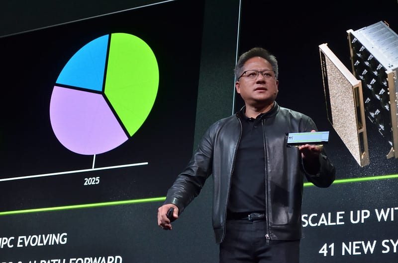 Nvidia CEO Jensen Huang showcasing chips at SC18